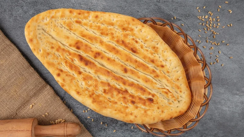 Prawdziwe Indyjskie Chleby Chlebki Naan o Smaku Czosnek i Kolendra 260 g NISHAAN